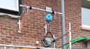 Support triangulaire + lisse pour équilibreur de charge